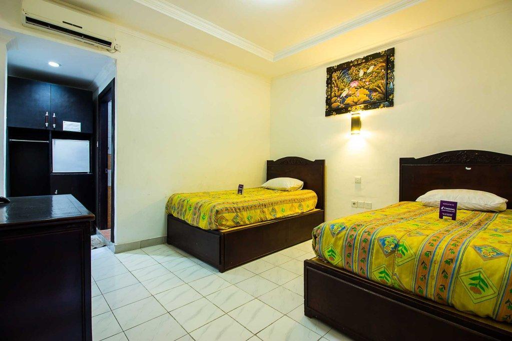 Hotel Sanjaya Managed By Tinggal Кута Экстерьер фото