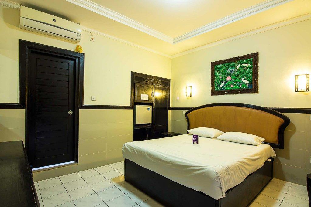 Hotel Sanjaya Managed By Tinggal Кута Экстерьер фото